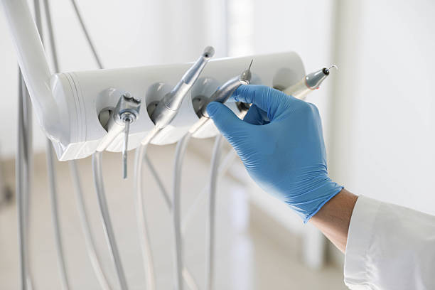 Professional Root Canal Treatment technician working in Bay City, MI